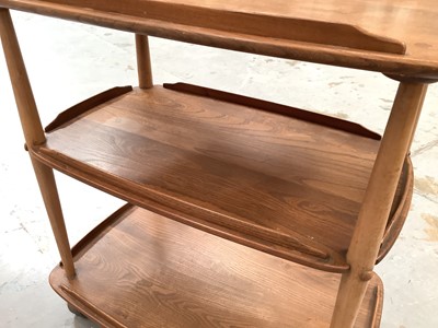 Lot 1202 - Ercol three tier tea trolley