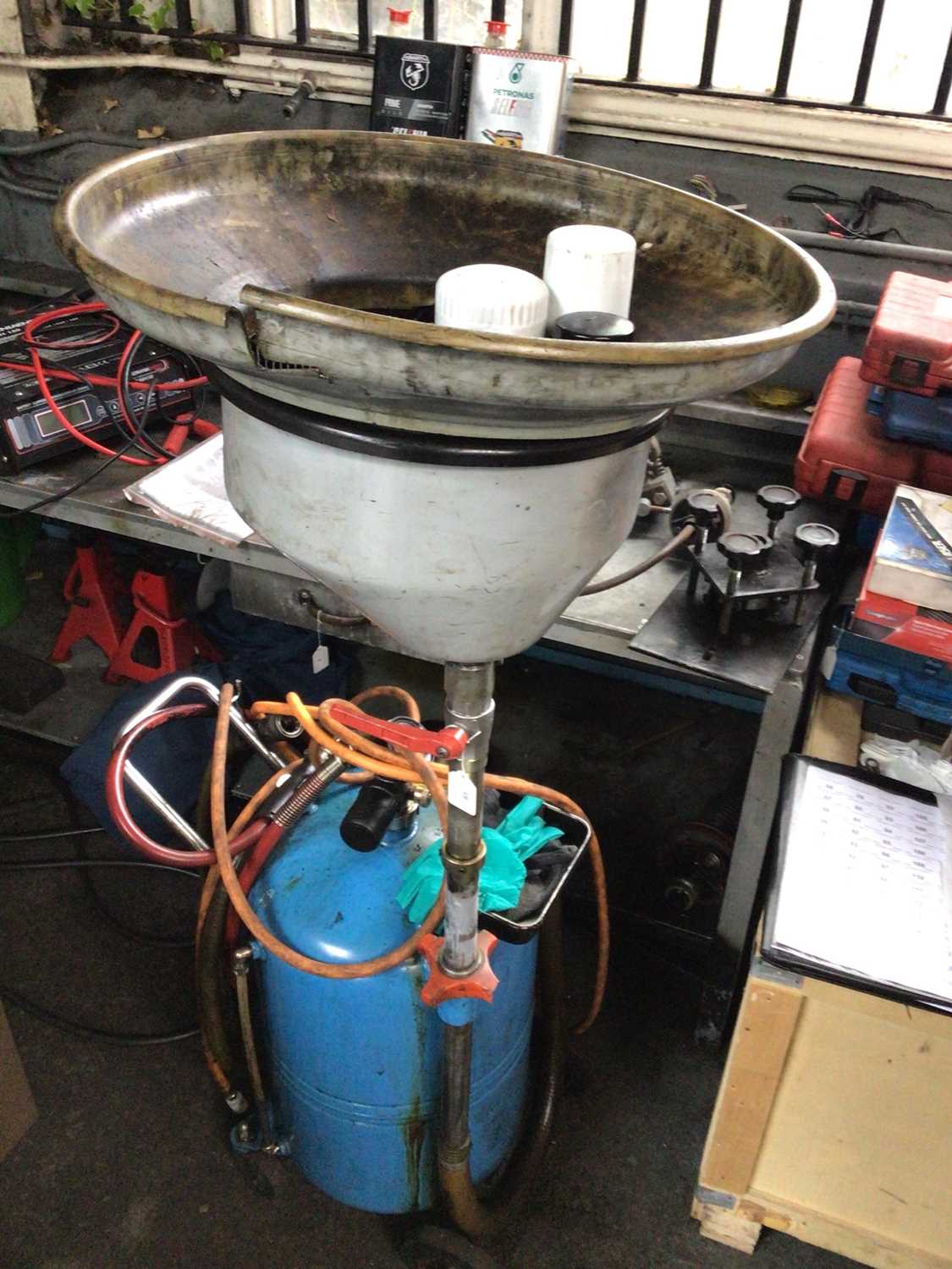 Lot 61 - Portable oil draining system with blue bottle