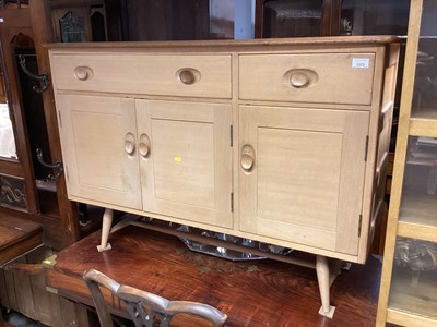 Lot 1372 - Ercol sideboard with two drawers and three cupboards below