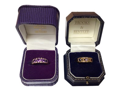Lot 177 - 9ct gold amethyst five stone ring interspaced with diamond set claws and a 9ct gold amethyst, garnet and sapphire ring