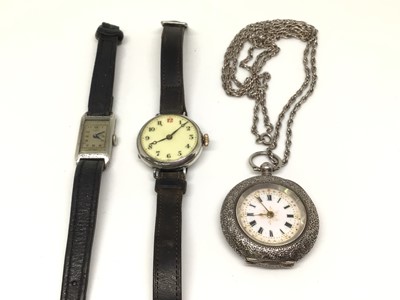 Lot 1027 - Two vintage silver cased wristwatches and a silver cased fob watch on silver chain