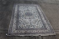 Lot 1430 - Large Eastern rug with central petalled...