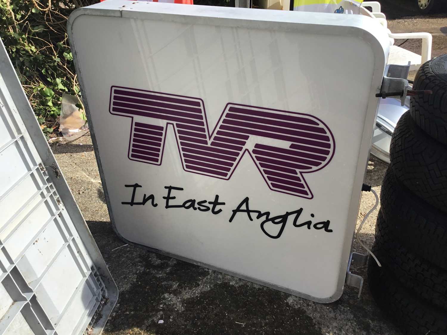 Lot 160 - TVR main agent 'In East Anglia' double sided illuminated hanging sign 98 x 98 cm