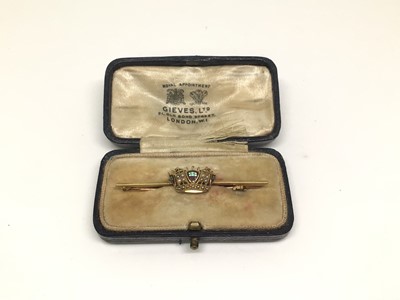 Lot 1123 - 15ct gold enamel and seed pearl crown bar brooch, 5cm