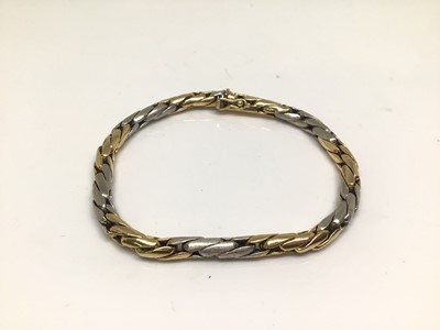 Lot 1125 - Yellow and white metal woven link bracelet, 19.5cm long