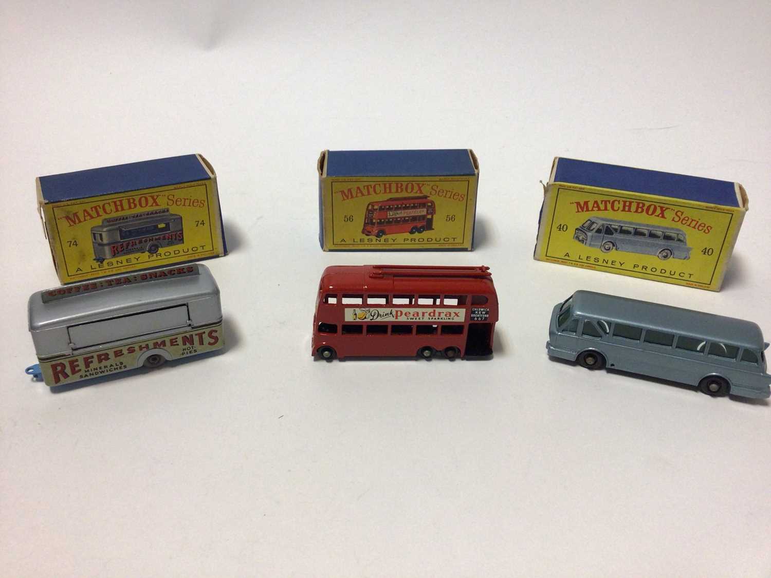 Lot 244 - Matchbox 1-75 Series No.56 Trolley Bus, No.40 Long Distance Coach, No.74 Mobile Canteen, No.23 Trailer Caravan, No.57 Land Rover Fire Truck, No.29 Fire Pumper Truck, all boxed (6)