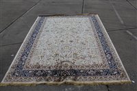 Lot 1435 - Kashan-style part silk rug, the cream field...