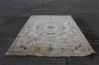 Lot 1437 - Large French-style carpet with cream ground...