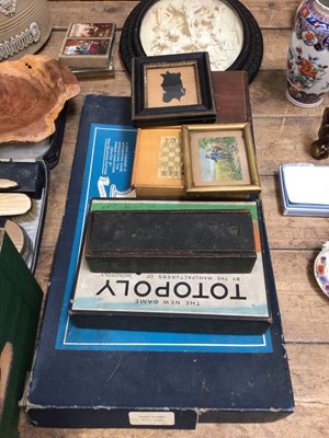 Lot 33 - Sundry items, including a group of silver plate, an enamelled dressing table set, a framed scene of the crucifixion in relief, board games, a Georgian silhouette, etc