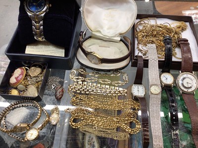 Lot 1049 - Two 9ct gold cased wristwatches on plated expandable bracelets, other watches, 9ct gold locket on chain, group of gold plated chains and costume jewellery