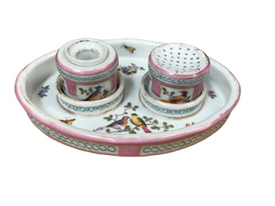Lot 99 - Continental porcelain inkstand with well and sander