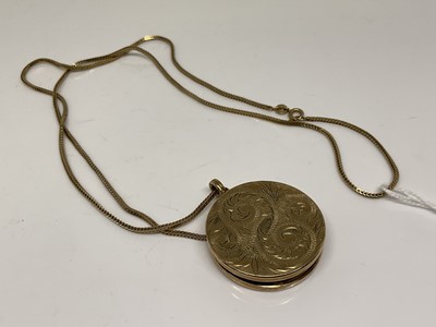 Lot 1082 - Gold locket on chain