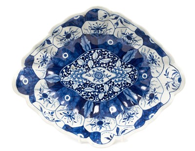 Lot 315 - Unusual Worcester centre dish, painted in blue with the Kangxi Lotus pattern, circa 1770