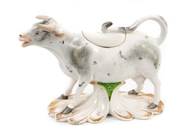Lot 253 - A Derby cow creamer and cover, circa 1820