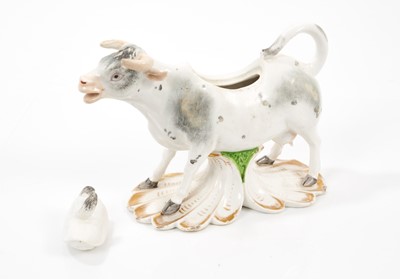 Lot 253 - A Derby cow creamer and cover, circa 1820