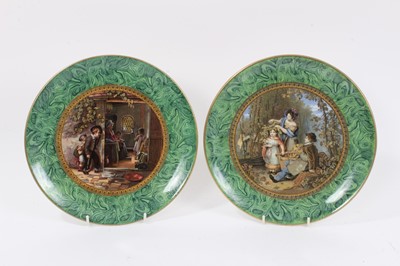 Lot 250 - A pair of F and R Pratt malachite bordered plates ‘The Hop Queen’ and ‘The Truant’, one with rare Prince Albert mark