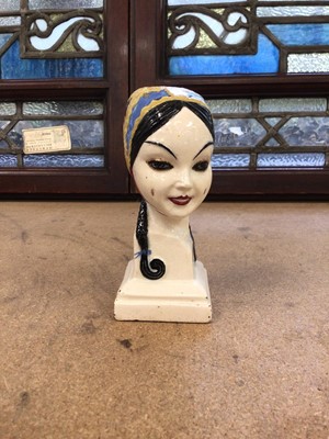 Lot 70 - Art Deco pottery bust of a young woman