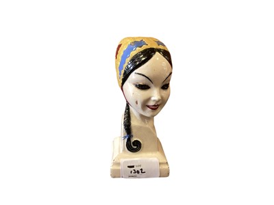 Lot 627 - Art Deco pottery bust of a young woman