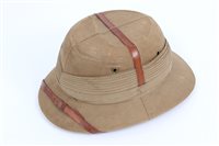 Lot 559 - British Military khaki pith helmet with brown...