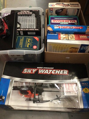 Lot 409 - Nikko radio command Sky Watcher helicopter, new in box, together with various board games