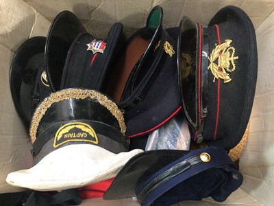 Lot 419 - Two boxes of military hats, helmets and others