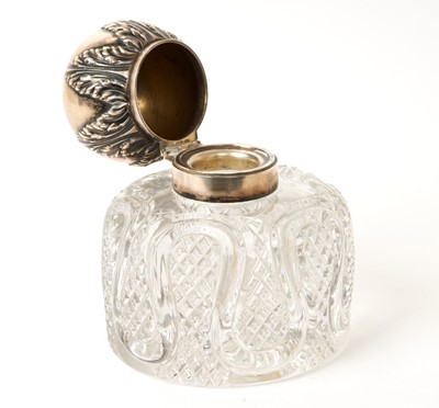 Lot 4 - Monumental Imperial Russian Fabergé silver and enamel and cut glass inkwell the globular hinged lid with Cyrillic three colour enamel monogram and acanthus leaf decoration to border, fine hobnail c...