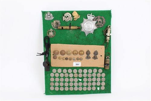 Lot 581 - One board mounted with Coinss, cap badges,...