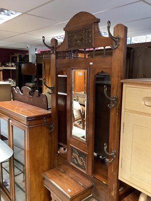 Lot 1371 - Edwardian walnut hall stand with anodised copper panel, original hooks and glove compartment