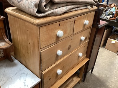 Lot 1312 - Victorian waxed pine chest of two short and two long drawers with white ceramic bun handles