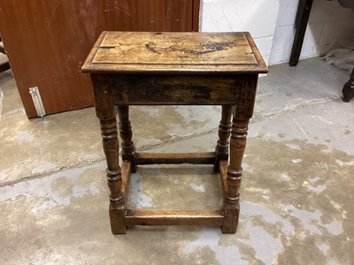 Lot 1228 - Antique oak joint stool and an eastern carved hardwood octagonal table (2)