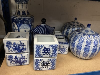 Lot 246 - Blue and white china - 2 onion jars, 1 large jar, 2 multi stacking jars, 1 candle jar (3 containers)