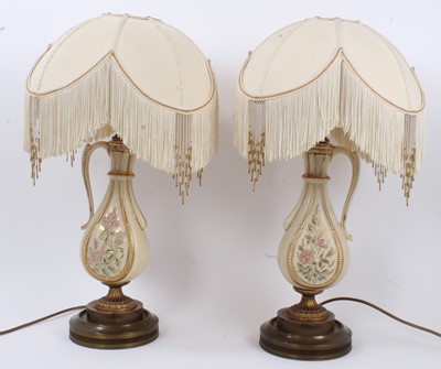 Lot 1007 - Pair of early 20th century blush ivory table lamps, converted from oil lamps