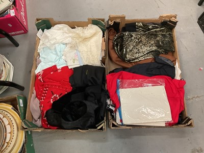 Lot 655 - Two boxes of vintage clothing, baby gowns, stockings etc