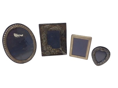 Lot 104 - Four silver photograph frames, various sizes