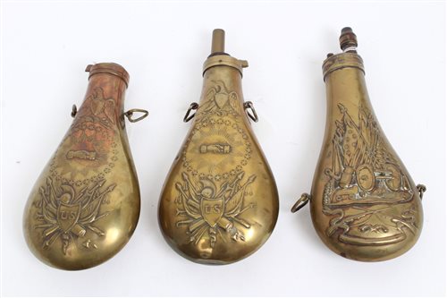 Lot 611 - Group of three 19th century brass powder...