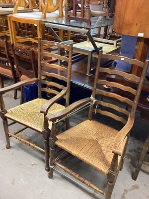 Lot 1235 - Set of six ladder back chairs with rush seats comprising four standards and two carvers