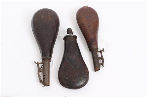 Lot 613 - 19th century powder flask, together with two...