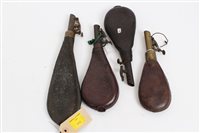 Lot 614 - Group of four 19th century leather shot flasks