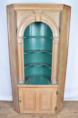 Lot 1401 - Antique pine standing corner cupboard, the upper section with shaped open shelves and barrel back, enclosed below by panelled door, 106c, wide x 63cm deep  x 200cm high