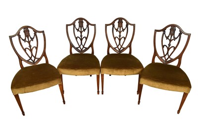 Lot 1417 - Set of four George III mahogany dining chairs in the Hepplewhite style