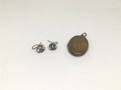 Lot 1058 - Pair of antique paste set gilt metal earrings and an oval gilt metal locket