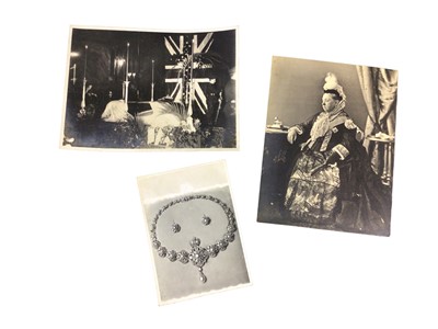 Lot 23 - H.M.Queen Victoria, fine portrait photograph mounted on card of The Queen taken 16th August 1887 20.5 x 15cm and another photograph of a stunning pearl and diamond necklace with matching earrings i...