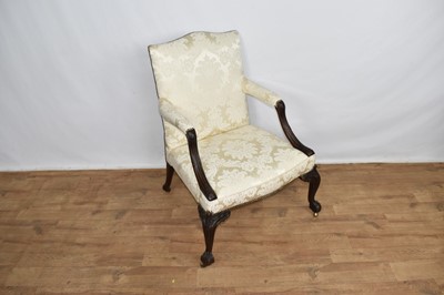 Lot 1424 - George III style mahogany Gainsborough armchair, with cream silk damask upholstery raised on ornate carved cabriole legs and castors