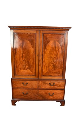 Lot 1425 - George III mahogany linen press