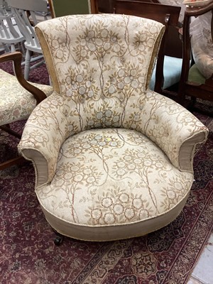 Lot 1269 - Victorian nursing chair with buttoned floral upholstery on turned front legs and castors