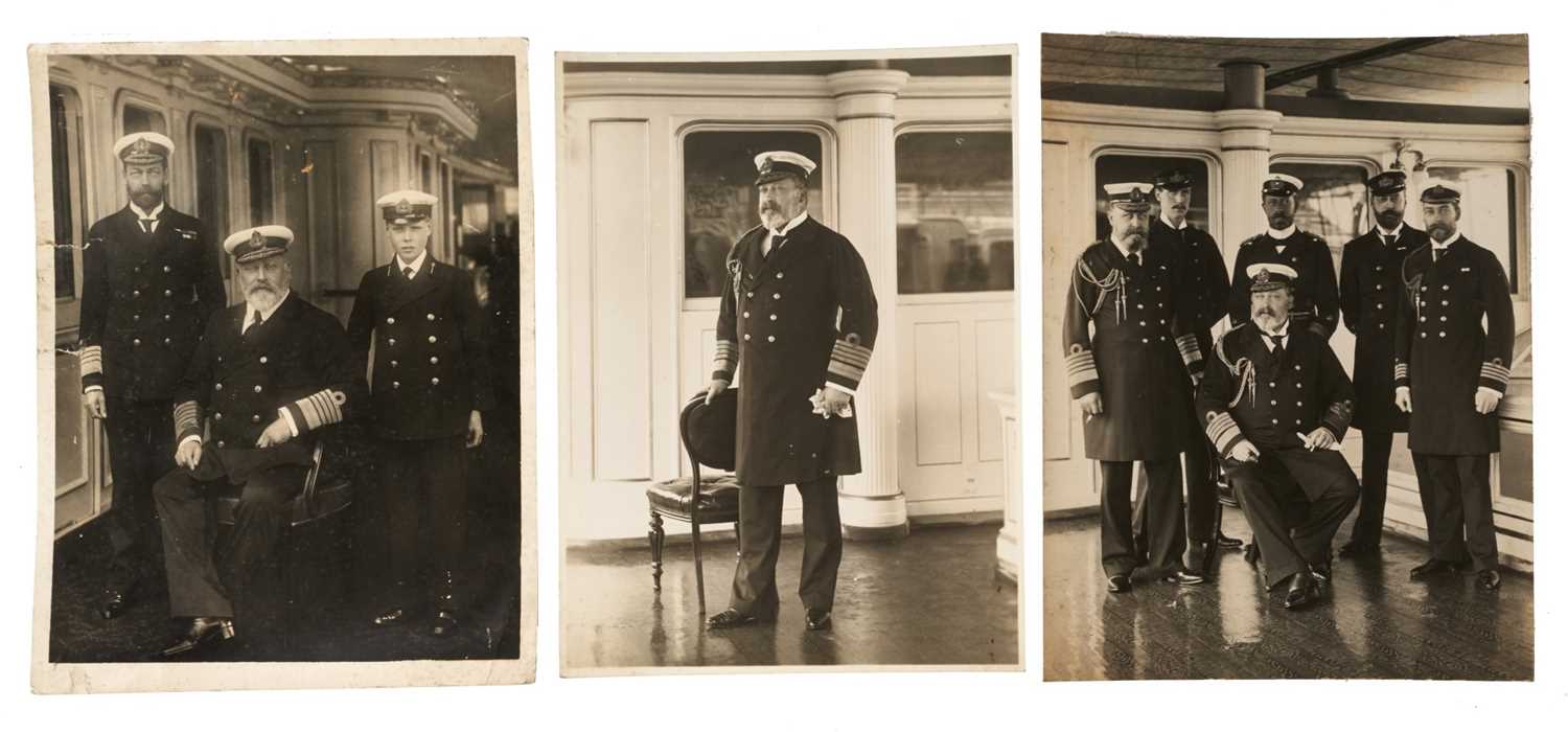 Lot 38 - H.M.King Edward VII, three fine portrait photographs of The King in Naval uniform on board the Royal Yacht Victoria and Albert, one with the future King George V and King Edward VIII, 21.5 x 16.5 (...