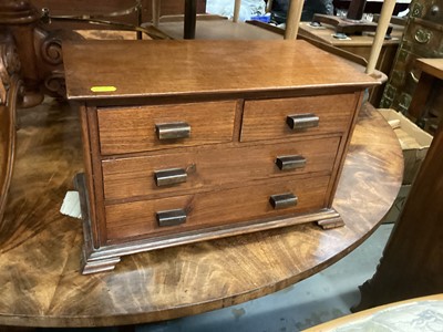 Lot 1281 - Miniature chest of two short and two long drawers, 40cm wide, 21cm high, 24.5cm high