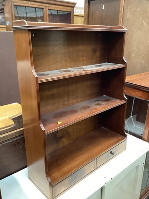 Lot 1298 - Mahogany hanging waterfall bookcase with two drawers below, 60.5cm wide, 20cm deep, 76.5cm high