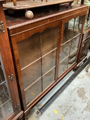 Lot 1301 - 1920's mahogany display cabinet with glass shelves enclosed by two glazed doors, 123cm wide, 31.5cm deep, 119cm high