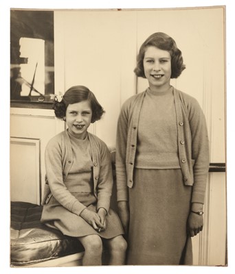 Lot 58 - T.R.H. The Princess Elizabeth (later H.M. Queen Elizabeth II) and The Princess Margaret, charming 1930s portrait photograph of the young Princesses on board the Royal Yacht The Victoria & Albert,...